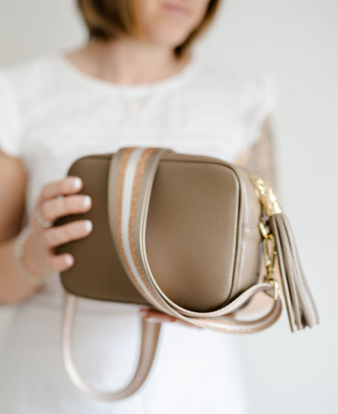 Taupe Leather Tassel Cross Body Bag with rose gold stripe bag strap