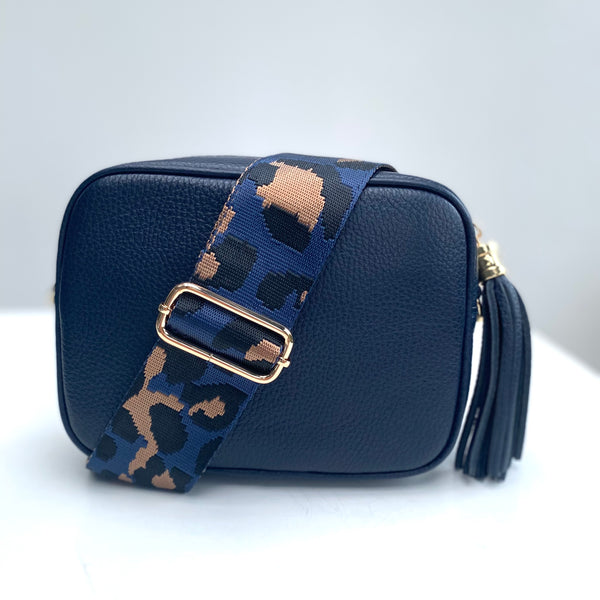 navy blue animal print bag strap on cobalt leather bag