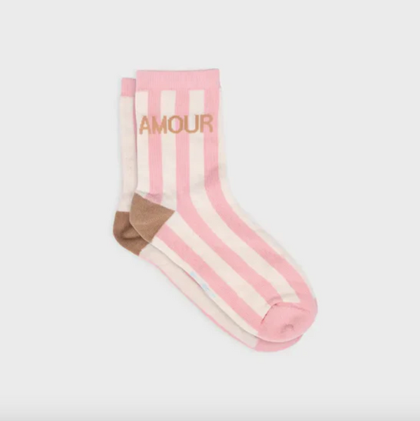 Pink and cream striped socks with 'AMOUR' text on a light gray background