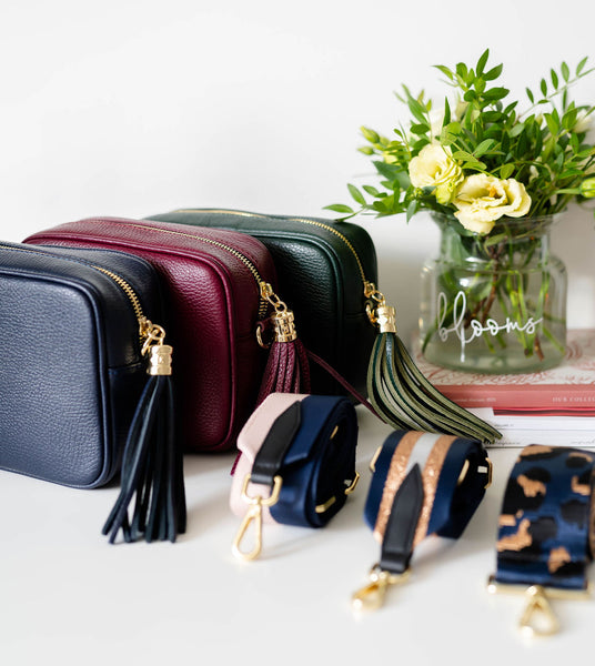 Navy Leather Tassel Cross Body Bag with navy and rose gold bag strap. AnySomething photography