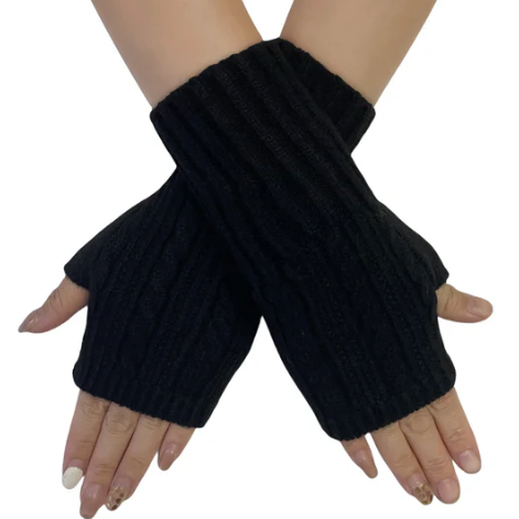 Black ribbed knit fingerless gloves worn on a white background