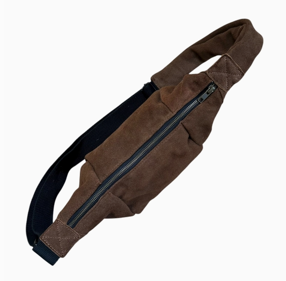 Brown suede waist bag with a zipper on a white background