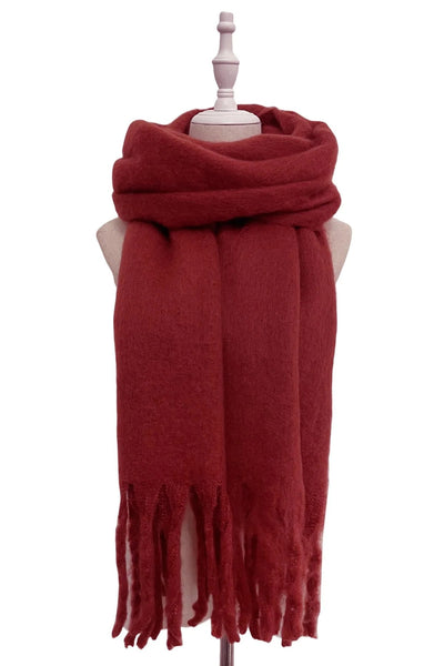 burgundy scarf with fringes on a mannequin against a white background