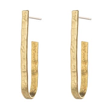 Gold hoop earrings on a white background