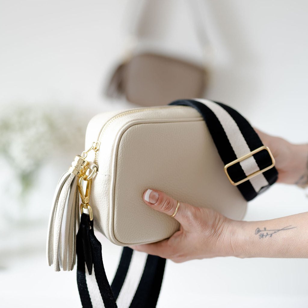 Worth the Tassel Crossbody Cream