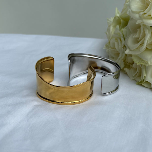 Gold and silver Wave Cuffs by Misgraceful