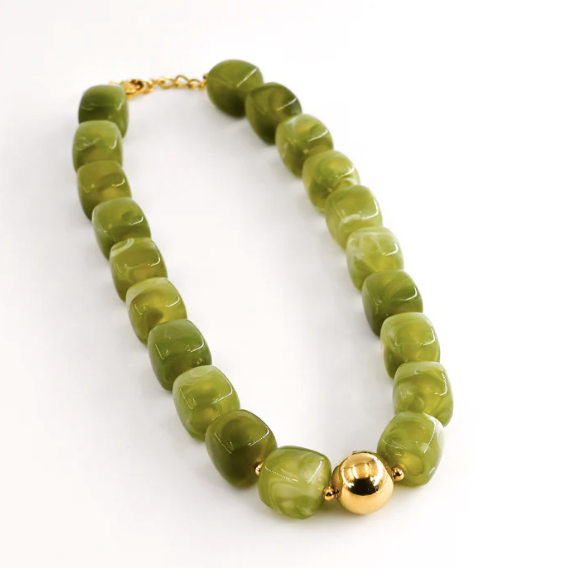 Green beaded necklace with a gold clasp on a white background