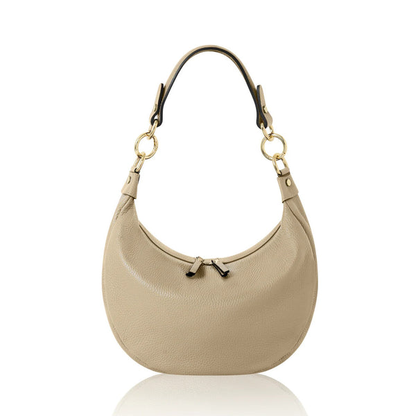 pale stone coleoured leather bag on a white background