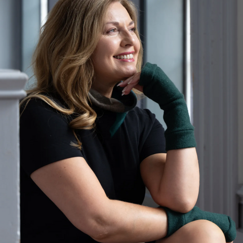 Turtle Doves Recycled Cashmere Wristwarmers - forest Green worn by model
