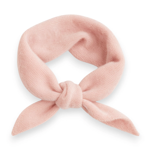 Pink triangle scarf tied on a white background