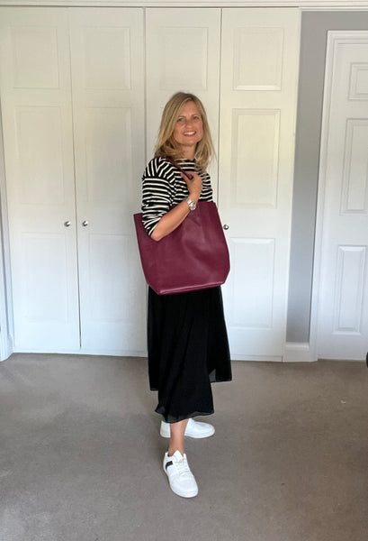 Burgundy Leather Tote Bag worn by Cathy at Alice's Wonders