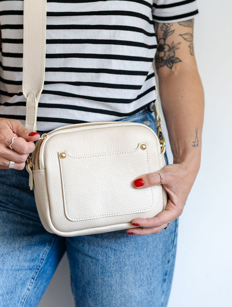 Cream leather double zip bag modelled and photographed by AnySomething Photography.