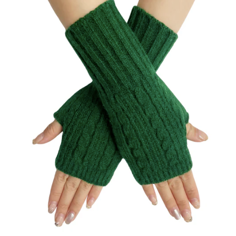 Green knitted arm warmers on a white background
