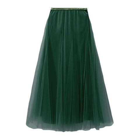 deep green floaty tull skirt with a gold waistband on a white background