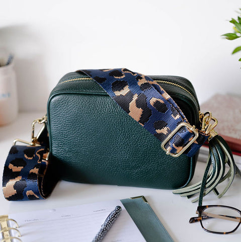 Dark Green Leather Tassel Cross Body Bag with navy animal print bag strap. Anysomething Photography