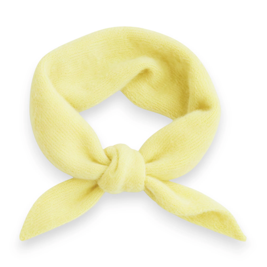 Yellow wool triangle scarf with a tie on a white background