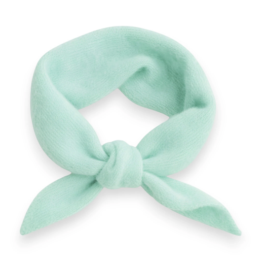 Mint green triangle scarf tied into knot on a white background