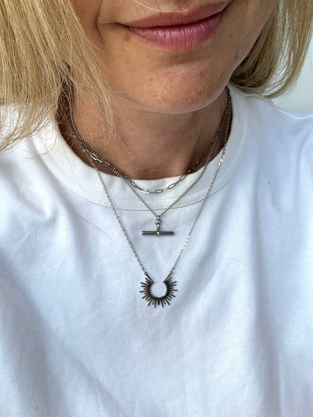 Silver sunburst, paperlink choker and T-Bar Necklace from MisGraceful worn by Cathy 