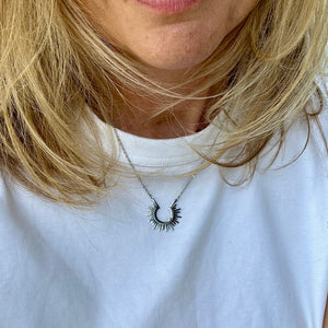 Silver sunburst Necklace from MisGraceful worn by Cathy