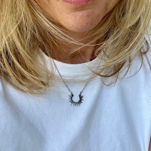 Silver sunburst Necklace from MisGraceful worn by Cathy