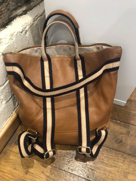 tan Leather Tote Backpack at the Residence Coworking Space