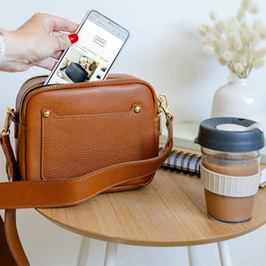 Tan leather double zip bag.  Photographed by AnySomething Photography.
