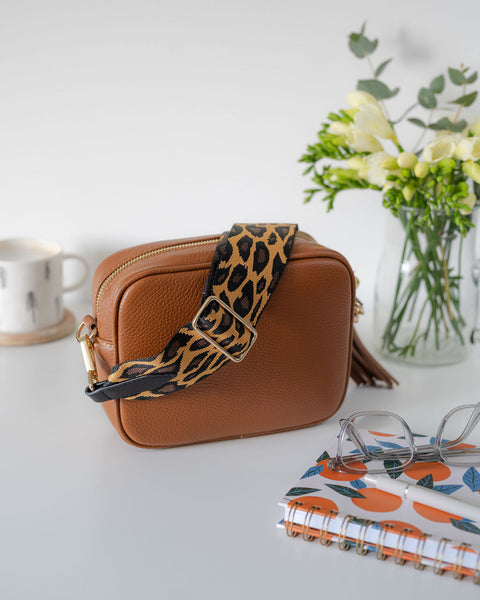 Tan Leather Tassel Cross Body Bag with camel animal print bag strap