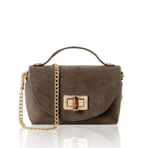 Brown suede handbag with a gold chain on a white background
