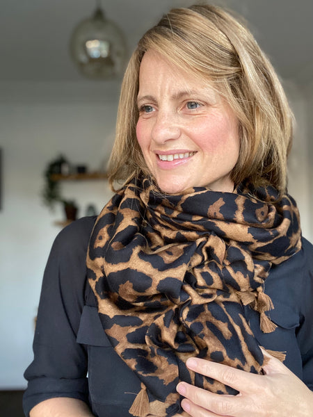 Classic Camel Leopard Print Scarf worn by Cathy at Alice's Wonders