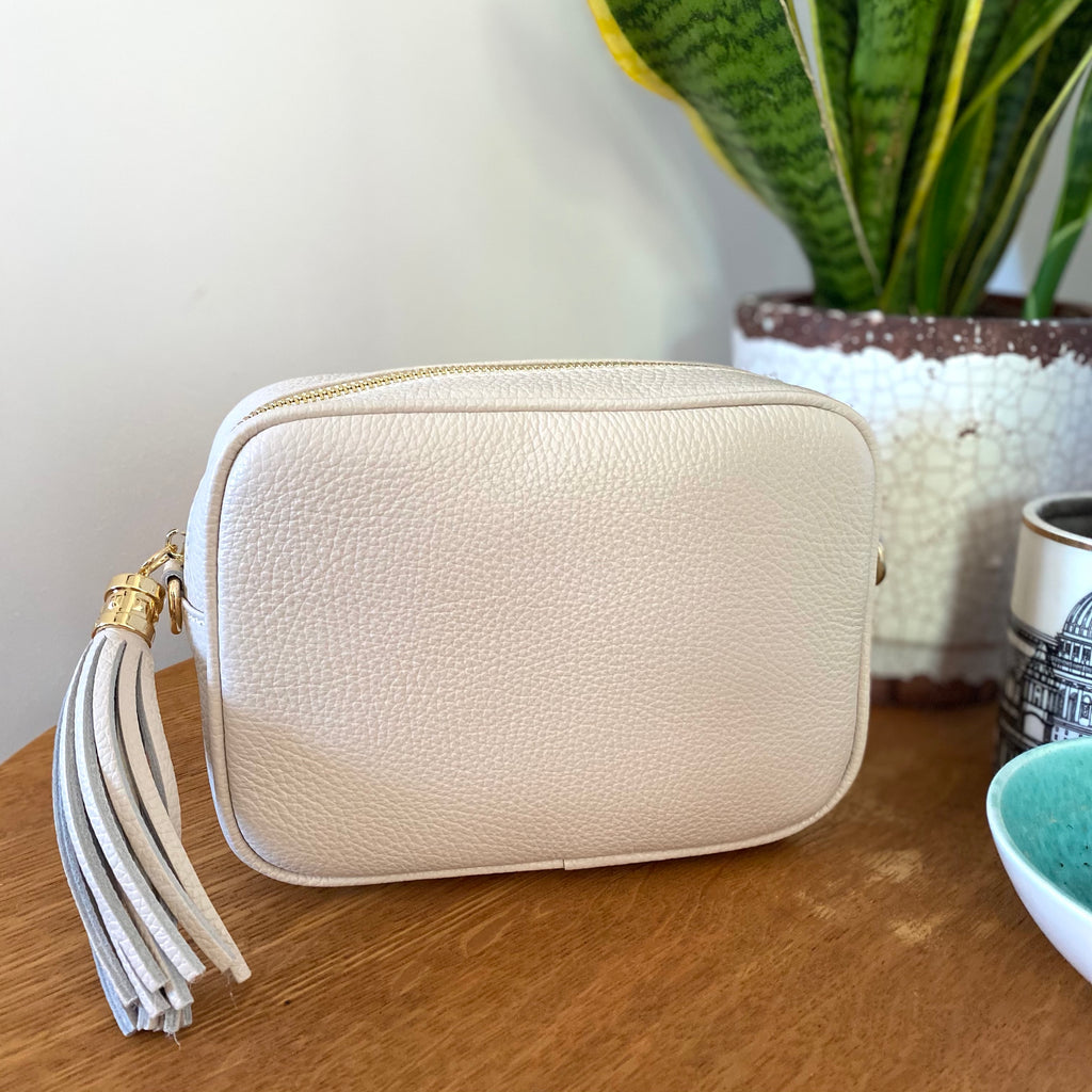 Worth the Tassel Crossbody Cream