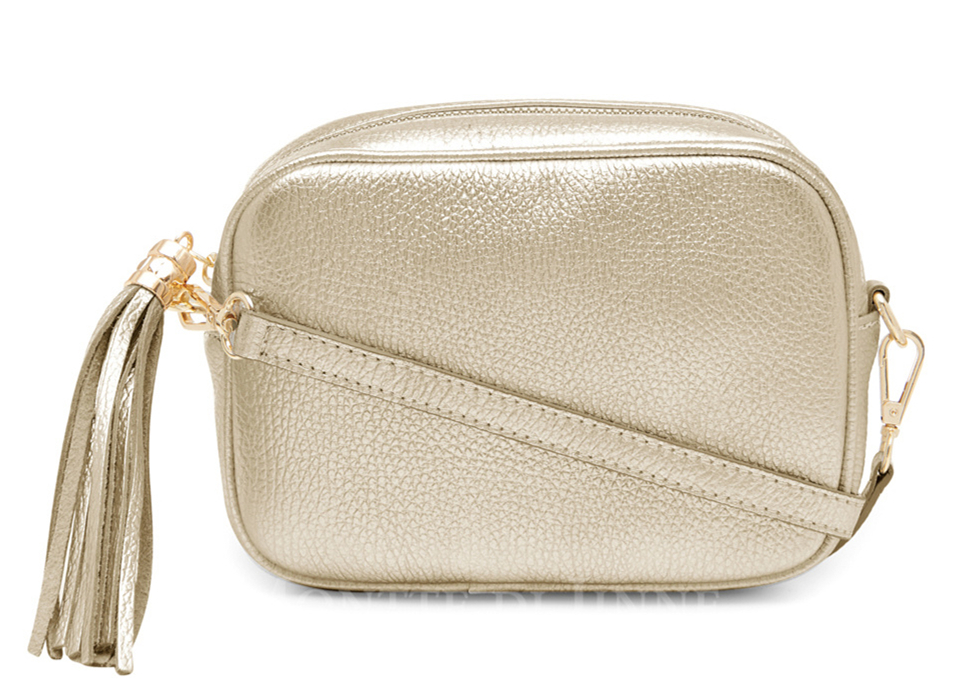 Gold cross over bag top