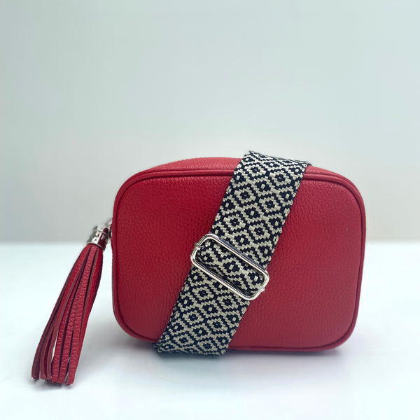 Red leather tassel bag and Monochrome Geometric Pattern Bag Strap with silver hardware