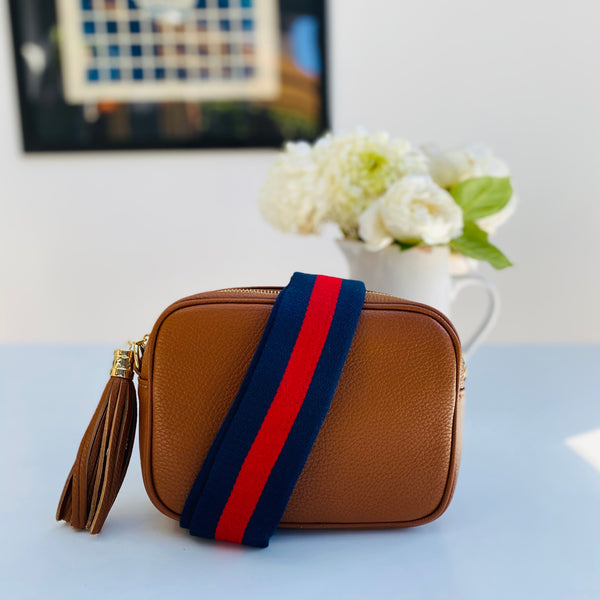 Tan Leather Tassel Cross Body Bag with red and navy bag strap